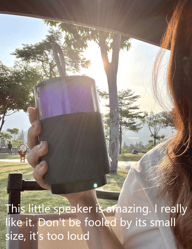 A girl is using a Bluetooth speaker purchased from the noveltyelec website