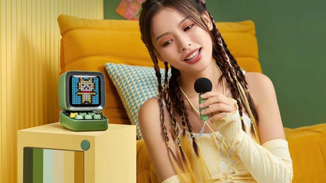 A girl is singing with noveltyelec's Bluetooth speaker