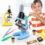 Children using the new children's microscope