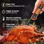 Compact digital thermometer showing accurate cooking temperature for meat